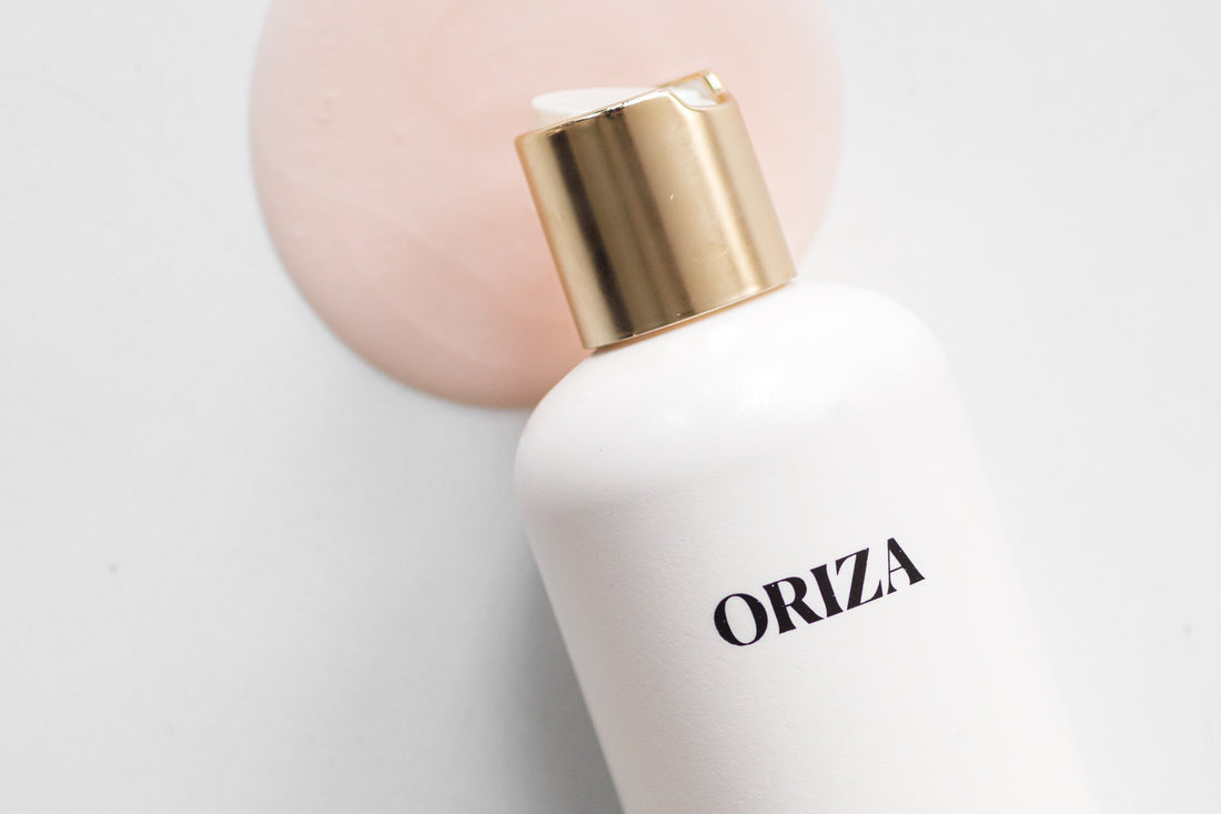 Oriza rice water shampoo with a soft pink gel-texture disc